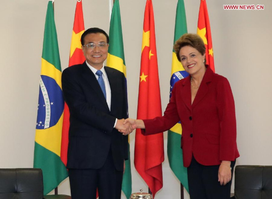 Chinese Premier Li Keqiang (L) shakes hands with Brazilian President Dilma Rousseff during their talks in Brasilia, capital of Brazil, May 19, 2015. (Xinhua/Liu Weibing) Chinese Premier Li Keqiang (L) shakes hands with Brazilian President Dilma Rousseff during their talks in Brasilia, capital of Brazil, May 19, 2015. (Xinhua/Liu Weibing)