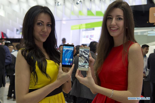 Models show the ZTE V7 device (L) and the Nubia Z9 (R) at the Mobile World Congress 2016 in Barcelona, Spain, Feb. 22, 2016. The Mobile World Congress (MWC), the most important mobile communication event in the world, opened its doors in Barcelona on Monday. (Photo: Xinhua/Lino De Vallier) Models show the ZTE V7 device (L) and the Nubia Z9 (R) at the Mobile World Congress 2016 in Barcelona, Spain, Feb. 22, 2016. The Mobile World Congress (MWC), the most important mobile communication event in the world, opened its doors in Barcelona on Monday. (Photo: Xinhua/Lino De Vallier)