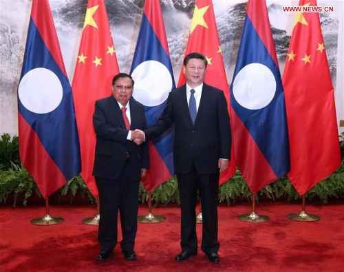 Chinese President Xi Jinping (R) holds talks with Lao President Bounnhang Vorachit in Beijing, capital of China, May 3, 2016.(Photo: Xinhua/Pang Xinglei) Chinese President Xi Jinping (R) holds talks with Lao President Bounnhang Vorachit in Beijing, capital of China, May 3, 2016.(Photo: Xinhua/Pang Xinglei)