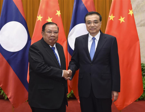 Chinese Premier Li Keqiang (R) meets with Lao President Bounnhang Vorachit, also General Secretary of the Central Committee of the Lao People's Revolutionary Party, in Beijing, capital of China, May 4, 2016. (Xinhua/Xie Huanchi) Chinese Premier Li Keqiang (R) meets with Lao President Bounnhang Vorachit, also General Secretary of the Central Committee of the Lao People's Revolutionary Party, in Beijing, capital of China, May 4, 2016. (Xinhua/Xie Huanchi)