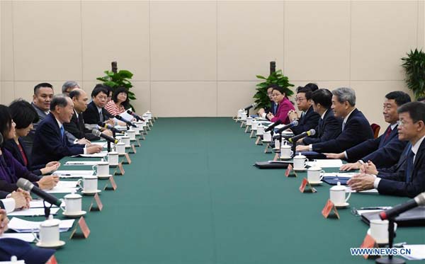 A dialogue between the Communist Party of China (CPC) and the Kuomintang (KMT) party is held in Beijing, capital of China, Dec. 23, 2016. (Xinhua/Chen Yehua) A dialogue between the Communist Party of China (CPC) and the Kuomintang (KMT) party is held in Beijing, capital of China, Dec. 23, 2016. (Xinhua/Chen Yehua)