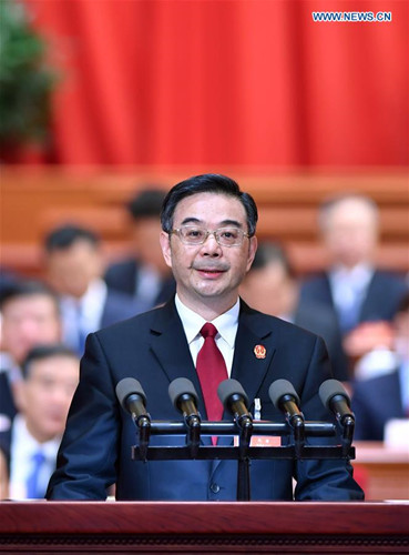 Chief Justice Zhou Qiang delivers a work report of the Supreme People's Court at the third plenary meeting of the fifth session of the 12th National People's Congress at the Great Hall of the People in Beijing, capital of China, March 12, 2017. (Xinhua/Li Tao) Chief Justice Zhou Qiang delivers a work report of the Supreme People's Court at the third plenary meeting of the fifth session of the 12th National People's Congress at the Great Hall of the People in Beijing, capital of China, March 12, 2017. (Xinhua/Li Tao)