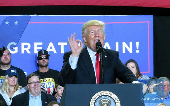 U.S. President Donald Trump (Front) delivers a speech during a rally marking his first 100 days in office in Harrisburg, Pennsylvania, the United States, April 29, 2017. (File photo: Xinhua/Yan Liang)