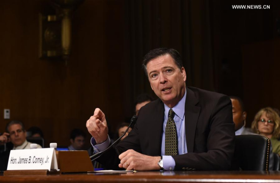 File photo taken on May 3, 2017 shows that James Comey, the director of Federal Bureau of Investigation (FBI), testifies before the Senate Judiciary Committee during a hearing in Washington D.C., the United States. (Xinhua/Bao Dandan) File photo taken on May 3, 2017 shows that James Comey, the director of Federal Bureau of Investigation (FBI), testifies before the Senate Judiciary Committee during a hearing in Washington D.C., the United States. (Xinhua/Bao Dandan)