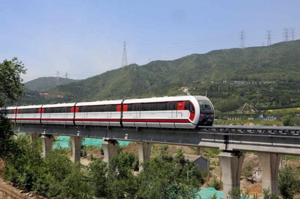 A maglev train undergoes testing recently on Beijing's new S1 line, which is scheduled to open later this year.Wu Kechao / For China Daily A maglev train undergoes testing recently on Beijing's new S1 line, which is scheduled to open later this year.Wu Kechao / For China Daily