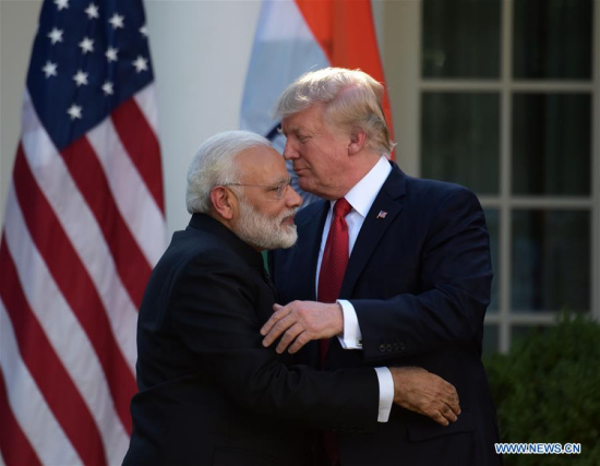 U.S. President Donald Trump (R) and Indian Prime Minister Narendra Modi hug after giving joint statements at the White House in Washington D.C., the United States, June 26, 2017. (Xinhua/Yin Bogu) U.S. President Donald Trump (R) and Indian Prime Minister Narendra Modi hug after giving joint statements at the White House in Washington D.C., the United States, June 26, 2017. (Xinhua/Yin Bogu)