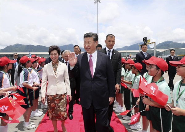 Chinese President Xi Jinping waves to the crowd at a see-off ceremony as he wraps up his Hong Kong visit, in Hong Kong, south China, July 1, 2017. (Xinhua/Lan Hongguang) Chinese President Xi Jinping waves to the crowd at a see-off ceremony as he wraps up his Hong Kong visit, in Hong Kong, south China, July 1, 2017. (Xinhua/Lan Hongguang)