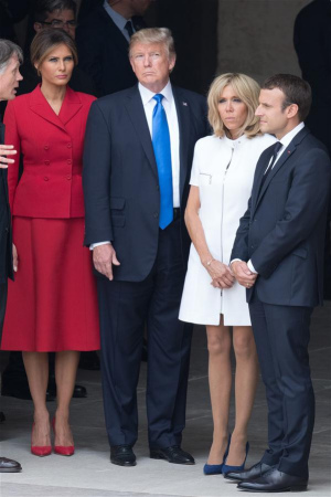 French President Emmanuel Macron (1st R) and his wife Brigitte Macron (2nd R), and U.S. President Donald Trump (3rd R) and his wife Melania Trump, attend a welcome ceremony at the Invalides in Paris, France, on July 13, 2017. (Xinhua/Jack Chan) French President Emmanuel Macron (1st R) and his wife Brigitte Macron (2nd R), and U.S. President Donald Trump (3rd R) and his wife Melania Trump, attend a welcome ceremony at the Invalides in Paris, France, on July 13, 2017. (Xinhua/Jack Chan)