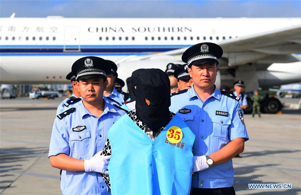 Suspects in telecom and online fraud cases are brought back to China from Fiji at Changchun Longjia International Airport, Changchun, northeast China's Jilin Province, Aug. 5, 2017. A total of 77 suspects in telecom and online fraud cases have been brought back to China from Fiji, the Ministry of Public Security announced Saturday. The suspects are accused in more than 50 cases involving more than 6 million yuan (892,000 U.S. dollars). (Xinhua/Lin Hong) Suspects in telecom and online fraud cases are brought back to China from Fiji at Changchun Longjia International Airport, Changchun, northeast China's Jilin Province, Aug. 5, 2017. A total of 77 suspects in telecom and online fraud cases have been brought back to China from Fiji, the Ministry of Public Security announced Saturday. The suspects are accused in more than 50 cases involving more than 6 million yuan (892,000 U.S. dollars). (Xinhua/Lin Hong)