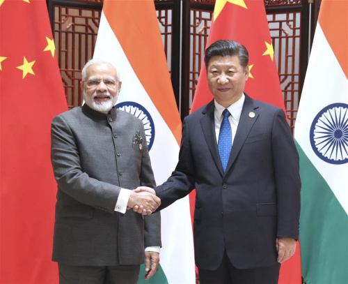 Chinese President Xi Jinping meets with Indian Prime Minister Narendra Modi in Xiamen, southeast China's Fujian Province, Sept. 5, 2017. Modi came to Xiamen to attend the ninth BRICS summit and the Dialogue of Emerging Market and Developing Countries. (Xinhua/Ma Zhancheng) Chinese President Xi Jinping meets with Indian Prime Minister Narendra Modi in Xiamen, southeast China's Fujian Province, Sept. 5, 2017. Modi came to Xiamen to attend the ninth BRICS summit and the Dialogue of Emerging Market and Developing Countries. (Xinhua/Ma Zhancheng)