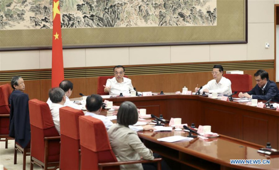 Chinese Premier Li Keqiang chairs a symposium on the reform of replacing business taxes with value-added tax (VAT), in Beijing, capital of China, Sept. 28, 2017. Chinese Vice Premier Zhang Gaoli also attended the symposium. (Xinhua/Ma Zhancheng) Chinese Premier Li Keqiang chairs a symposium on the reform of replacing business taxes with value-added tax (VAT), in Beijing, capital of China, Sept. 28, 2017. Chinese Vice Premier Zhang Gaoli also attended the symposium. (Xinhua/Ma Zhancheng)