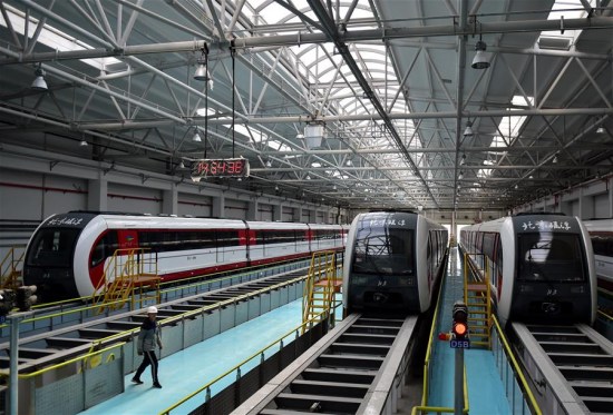 Photo taken on Oct. 16, 2017 shows maglev trains at the garage in Beijing, capital of China. Beijing's first medium-low speed maglev line is expected to start trial operation by the end of this year. The 10.2-km S1 line will connect the western suburban districts of Mentougou and Shijingshan. (Xinhua/Zhang Chenlin) Photo taken on Oct. 16, 2017 shows maglev trains at the garage in Beijing, capital of China. Beijing's first medium-low speed maglev line is expected to start trial operation by the end of this year. The 10.2-km S1 line will connect the western suburban districts of Mentougou and Shijingshan. (Xinhua/Zhang Chenlin)