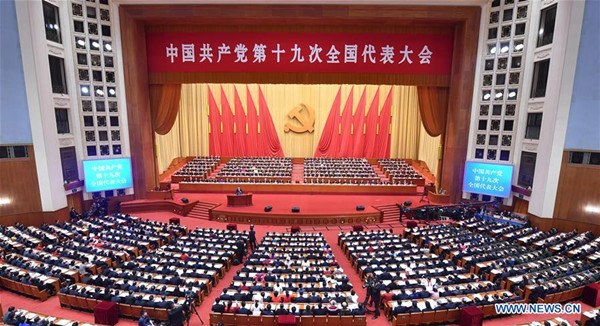 Xi Jinping delivers a report to the 19th National Congress of the Communist Party of China (CPC) on behalf of the 18th Central Committee of the CPC at the Great Hall of the People in Beijing, capital of China, Oct. 18, 2017. The CPC opened the 19th National Congress at the Great Hall of the People Wednesday morning. (Xinhua/Li Tao) Xi Jinping delivers a report to the 19th National Congress of the Communist Party of China (CPC) on behalf of the 18th Central Committee of the CPC at the Great Hall of the People in Beijing, capital of China, Oct. 18, 2017. The CPC opened the 19th National Congress at the Great Hall of the People Wednesday morning. (Xinhua/Li Tao)