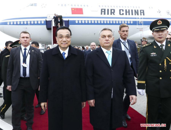 Chinese Premier Li Keqiang is welcomed by Hungarian Prime Minister Viktor Orban and other senior officials upon his arrival in Budapest, Hungary, Nov. 26, 2017, for an official visit to the country and the sixth meeting of heads of government of China and 16 Central and Eastern European Countries (CEEC). (Xinhua/Ju Peng) Chinese Premier Li Keqiang is welcomed by Hungarian Prime Minister Viktor Orban and other senior officials upon his arrival in Budapest, Hungary, Nov. 26, 2017, for an official visit to the country and the sixth meeting of heads of government of China and 16 Central and Eastern European Countries (CEEC). (Xinhua/Ju Peng)