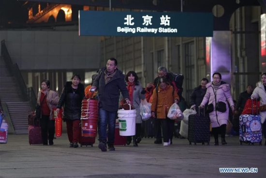 Passengers prepare to take the train at Beijing Railway Station in Beijing, capital of China, Feb. 1, 2018. The 2018 Spring Festival travel rush, known as the Chunyun, started on Thursday and will last till March 12. About 2.98 billion trips are expected to be made during the Chunyun. The Spring Festival, or Chinese Lunar New Year, falls on Feb. 16 this year. (Xinhua/Xing Guangli) Passengers prepare to take the train at Beijing Railway Station in Beijing, capital of China, Feb. 1, 2018. The 2018 Spring Festival travel rush, known as the Chunyun, started on Thursday and will last till March 12. About 2.98 billion trips are expected to be made during the Chunyun. The Spring Festival, or Chinese Lunar New Year, falls on Feb. 16 this year. (Xinhua/Xing Guangli)