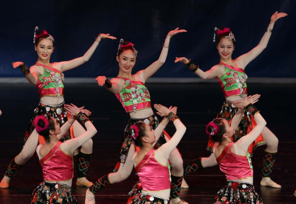 Artists from China's Guangxi Zhuang autonomous region perform to celebrate the Spring Festival and commemorate the 60th anniversary of the establishment of diplomatic relations between China and Algeria at the Opera of Algiers in Algeria on Tuesday. Xinhua Artists from China's Guangxi Zhuang autonomous region perform to celebrate the Spring Festival and commemorate the 60th anniversary of the establishment of diplomatic relations between China and Algeria at the Opera of Algiers in Algeria on Tuesday. Xinhua