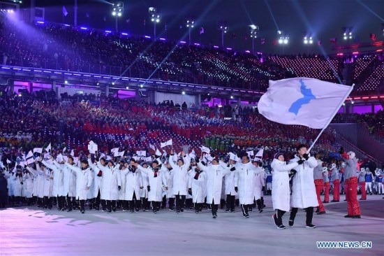 The Democratic People's Republic of Korea (DPRK) and South Korea marched together under a unified Korean flag during the opening ceremony of the 2018 PyeongChang Winter Olympic Games at PyeongChang Olympic Stadium in PyeongChang, South Korea, Feb. 9, 2018. (Xinhua/Lui Siu Wai) The Democratic People's Republic of Korea (DPRK) and South Korea marched together under a unified Korean flag during the opening ceremony of the 2018 PyeongChang Winter Olympic Games at PyeongChang Olympic Stadium in PyeongChang, South Korea, Feb. 9, 2018. (Xinhua/Lui Siu Wai)