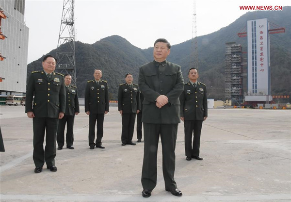 Chinese PresidentXi Jinping(front), also general secretary of the Communist Party of China Central Committee and chairman of the Central Military Commission, visits a satellite launch site at a military base in southwest China's Sichuan Province, Feb. 10, 2018. Xi visited the military base on Saturday ahead of the Spring Festival, which falls on Feb. 16 this year. He extended festival greetings to all officers and soldiers of thePeople's Liberation Armyand the armed police force, and all militia and reserve personnel. (Xinhua/Li Gang) Chinese PresidentXi Jinping(front), also general secretary of the Communist Party of China Central Committee and chairman of the Central Military Commission, visits a satellite launch site at a military base in southwest China's Sichuan Province, Feb. 10, 2018. Xi visited the military base on Saturday ahead of the Spring Festival, which falls on Feb. 16 this year. He extended festival greetings to all officers and soldiers of thePeople's Liberation Armyand the armed police force, and all militia and reserve personnel. (Xinhua/Li Gang)