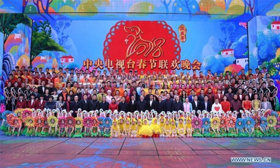 Huang Kunming, a member of the Political Bureau of the Communist Party of China (CPC) Central Committee and the head of the Publicity Department of the CPC Central Committee, poses for a group photo when inspecting the rehearsal of China Central Television's annual Spring Festival TV gala in Beijing, capital of China, Feb. 11, 2018. (Xinhua/Yan Yan) Huang Kunming, a member of the Political Bureau of the Communist Party of China (CPC) Central Committee and the head of the Publicity Department of the CPC Central Committee, poses for a group photo when inspecting the rehearsal of China Central Television's annual Spring Festival TV gala in Beijing, capital of China, Feb. 11, 2018. (Xinhua/Yan Yan)