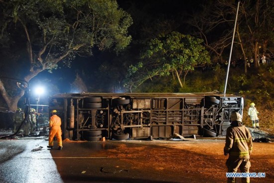 Rescuers work at the accident site where a double-decker bus overturned in New Territories in Hong Kong Special Administrative Region, south China, Feb. 10, 2018. (Xinhua/Wang Shen) Rescuers work at the accident site where a double-decker bus overturned in New Territories in Hong Kong Special Administrative Region, south China, Feb. 10, 2018. (Xinhua/Wang Shen)
