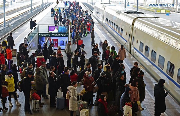 Passengers wait for a train at the Shenyang North Railway Station in Shenyang, capital of northeast China's Liaoning Province, Feb. 21, 2018. On the last day of the Spring Festival holiday, China greets a travel peak for returning to workplace. (Xinhua/Yang Qing) Passengers wait for a train at the Shenyang North Railway Station in Shenyang, capital of northeast China's Liaoning Province, Feb. 21, 2018. On the last day of the Spring Festival holiday, China greets a travel peak for returning to workplace. (Xinhua/Yang Qing)