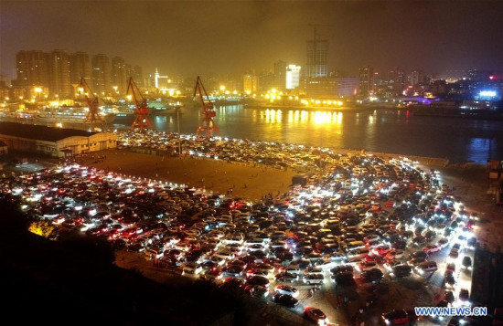 Vehicles wait for ferry service at Xiuying port in Haikou, capital of south China's Hainan Province, Feb. 21, 2018.(Xinhua/Zhao Yingquan) Vehicles wait for ferry service at Xiuying port in Haikou, capital of south China's Hainan Province, Feb. 21, 2018.(Xinhua/Zhao Yingquan)