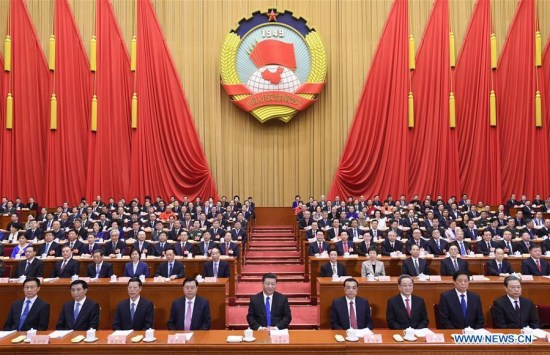 Xi Jinping (C, front), Li Keqiang (4th R, front), Zhang Dejiang (4th L, front), Yu Zhengsheng (3rd R, front), Zhang Gaoli (3rd L, front), Li Zhanshu (2nd R, front), Wang Huning (2nd L, front), Zhao Leji (1st R, front), and Han Zheng (1st L, front) attend the opening meeting of the first session of the 13th National Committee of the Chinese People's Political Consultative Conference at the Great Hall of the People in Beijing, capital of China, March 3, 2018. (Xinhua/Li Xueren) Xi Jinping (C, front), Li Keqiang (4th R, front), Zhang Dejiang (4th L, front), Yu Zhengsheng (3rd R, front), Zhang Gaoli (3rd L, front), Li Zhanshu (2nd R, front), Wang Huning (2nd L, front), Zhao Leji (1st R, front), and Han Zheng (1st L, front) attend the opening meeting of the first session of the 13th National Committee of the Chinese People's Political Consultative Conference at the Great Hall of the People in Beijing, capital of China, March 3, 2018. (Xinhua/Li Xueren)