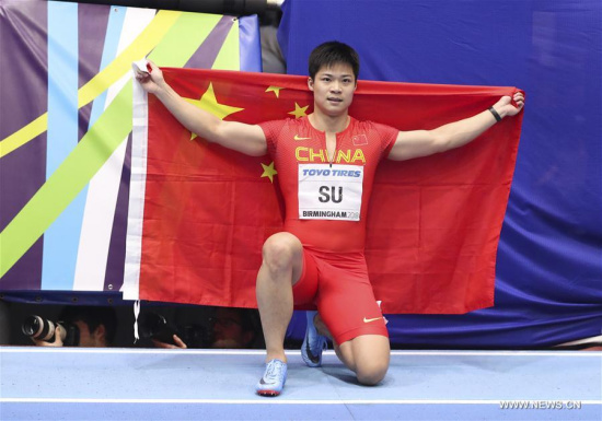 Su Bingtian of China celebrates after the men's 60 metres final during the IAAF World Indoor Championships at Arena Birmingham in Birmingham, Britain on March 3, 2018. Su took the silver with 6.42 seconds. (Xinhua/Han Yan)