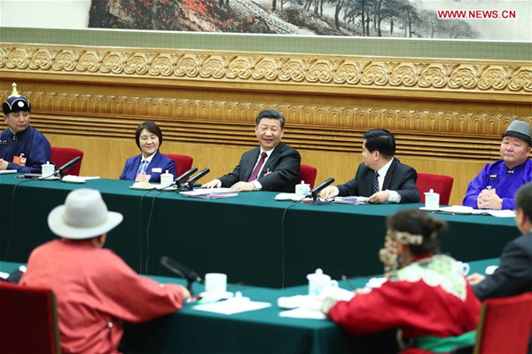 Chinese President Xi Jinping, also general secretary of the Communist Party of China (CPC) Central Committee and chairman of the Central Military Commission, joins a panel discussion with the deputies from Inner Mongolia Autonomous Region at the first session of the 13th National People's Congress in Beijing, capital of China, March 5, 2018. (Xinhua/Xie Huanchi) Chinese President Xi Jinping, also general secretary of the Communist Party of China (CPC) Central Committee and chairman of the Central Military Commission, joins a panel discussion with the deputies from Inner Mongolia Autonomous Region at the first session of the 13th National People's Congress in Beijing, capital of China, March 5, 2018. (Xinhua/Xie Huanchi)