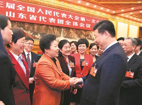 President Xi Jinping, who is also general secretary of the Communist Party of China Central Committee, speaks with deputies to the National People's Congress from Shandong province at a panel discussion on Thursday in Beijing. (Photo/Xinhua) President Xi Jinping, who is also general secretary of the Communist Party of China Central Committee, speaks with deputies to the National People's Congress from Shandong province at a panel discussion on Thursday in Beijing. (Photo/Xinhua)