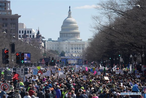 People take part in the March for Our Lives rally in Washington D.C., the United States, on March 24, 2018. Hundreds of thousands of people gathered at Pennsylvania Avenue in Washington D.C. on Saturday for the March for Our Lives gun control rally, demanding the end of gun violence and mass school shootings. (Xinhua/Yang Chenglin) People take part in the March for Our Lives rally in Washington D.C., the United States, on March 24, 2018. Hundreds of thousands of people gathered at Pennsylvania Avenue in Washington D.C. on Saturday for the March for Our Lives gun control rally, demanding the end of gun violence and mass school shootings. (Xinhua/Yang Chenglin)