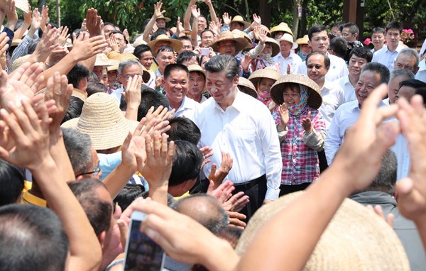 Chinese President Xi Jinping, also general secretary of the Communist Party of China Central Committee and chairman of the Central Military Commission, shakes hands with villagers in Shicha Village of Xiuying District in Haikou, south China's Hainan Province, April 13, 2018. Xi made an inspection tour in Hainan from Wednesday to Friday. (Xinhua/Xie Huanchi) Chinese President Xi Jinping, also general secretary of the Communist Party of China Central Committee and chairman of the Central Military Commission, shakes hands with villagers in Shicha Village of Xiuying District in Haikou, south China's Hainan Province, April 13, 2018. Xi made an inspection tour in Hainan from Wednesday to Friday. (Xinhua/Xie Huanchi)
