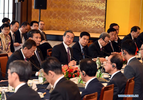 Chinese State Councilor and Foreign Minister Wang Yi attends the high-level economic dialogue between China and Japan in Tokyo, Japan, on April 16, 2018. Wang Yi on Monday co-chaired the fourth high-level economic dialogue between China and Japan with Japanese Foreign Minister Taro Kono here. (Xinhua/Ma Ping) Chinese State Councilor and Foreign Minister Wang Yi attends the high-level economic dialogue between China and Japan in Tokyo, Japan, on April 16, 2018. Wang Yi on Monday co-chaired the fourth high-level economic dialogue between China and Japan with Japanese Foreign Minister Taro Kono here. (Xinhua/Ma Ping)