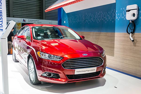 Ford Fusion Energi Plug-in hybrid car is displayed, with a charging box on the wall, at an exhibition in Shanghai last year. HAO YAN / CHINA DAILY Ford Fusion Energi Plug-in hybrid car is displayed, with a charging box on the wall, at an exhibition in Shanghai last year. HAO YAN / CHINA DAILY