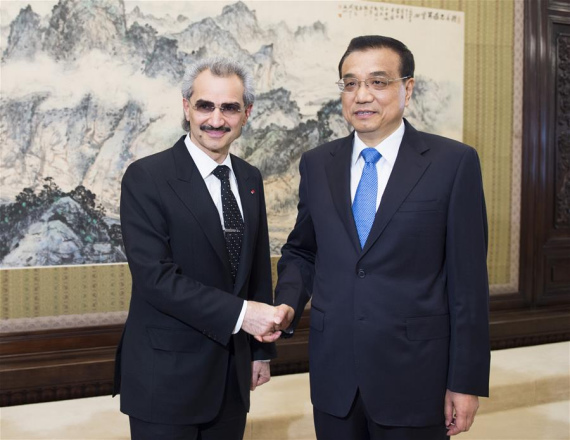 Chinese Premier Li Keqiang (R) meets with visiting Saudi Arabian Prince Alwaleed Bin Talal Bin Abdulaziz Alsaud, chairman of the Kingdom Holding Company, a leading investment holding company based in Riyadh, in Beijing, capital of China, May 19, 2016. (Photo: Xinhua/Xie Huanchi)