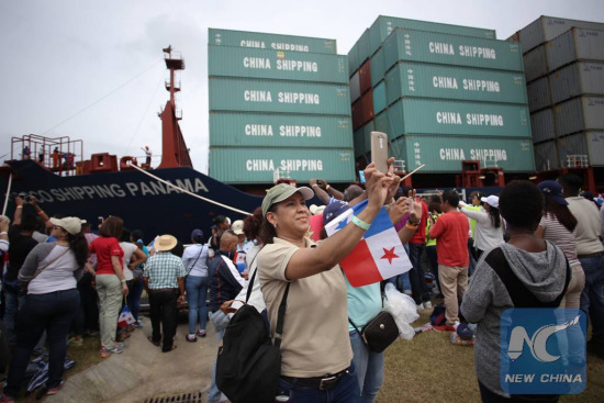 Residents welcome the container vessel COSCO Shipping Panama at the expanded Panama Canal in the city of Colon, capital of Colon Province, Panama, on June 26, 2016. (Xinhua/Mauricio Valenzuela) Residents welcome the container vessel COSCO Shipping Panama at the expanded Panama Canal in the city of Colon, capital of Colon Province, Panama, on June 26, 2016. (Xinhua/Mauricio Valenzuela)