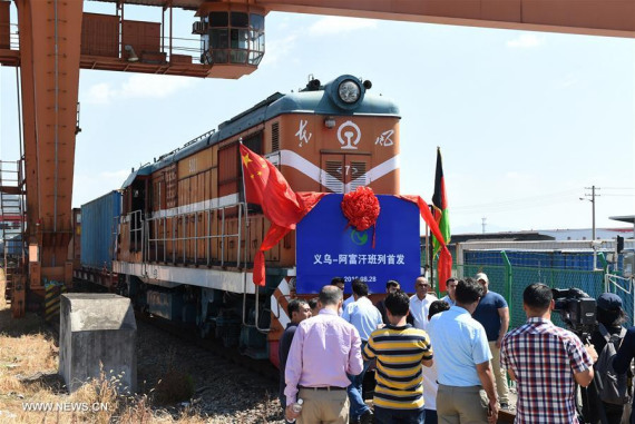 People attend the launching ceremony of the first freight train from Yiwu to Afghanistan in Yiwu, east China's Zhejiang Province, Aug. 28, 2016. (Photo: Xinhua/Gong Xianming) People attend the launching ceremony of the first freight train from Yiwu to Afghanistan in Yiwu, east China's Zhejiang Province, Aug. 28, 2016. (Photo: Xinhua/Gong Xianming)