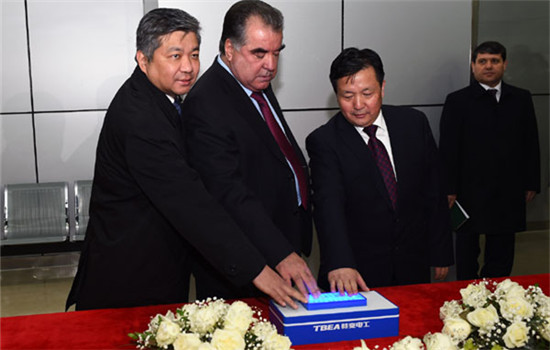 Tajikistan's President Emomali Rahmon(center), Chairman of TBEA Zhang Xin, (right), and China's Ambassador to Kazakhstan Yue Bin(left), press the start button together and announce the start of the thermal power plant operation. (Photo provided to chinadaily.com.cn) Tajikistan's President Emomali Rahmon(center), Chairman of TBEA Zhang Xin, (right), and China's Ambassador to Kazakhstan Yue Bin(left), press the start button together and announce the start of the thermal power plant operation. (Photo provided to chinadaily.com.cn)