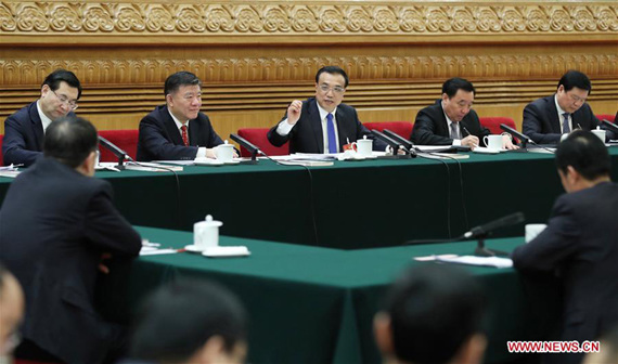 Chinese Premier Li Keqiang joins a panel discussion with deputies to the 12th National People's Congress (NPC) from Shaanxi Province at the annual session of the NPC in Beijing, capital of China, March 9, 2017. (Xinhua/Xie Huanchi)