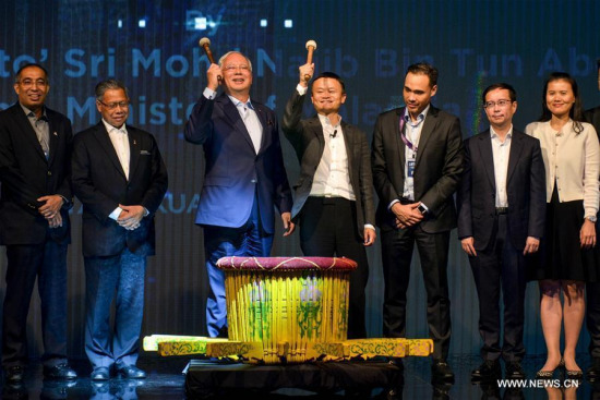 Malaysian Prime Minister Najib Razak (3rd L) and Alibaba's executive chairman Jack Ma (4th L) attend a ceremony in Kuala Lumpur, Malaysia, March 22, 2017. (Xinhua/Chong Voon Chung) Malaysian Prime Minister Najib Razak (3rd L) and Alibaba's executive chairman Jack Ma (4th L) attend a ceremony in Kuala Lumpur, Malaysia, March 22, 2017. (Xinhua/Chong Voon Chung)