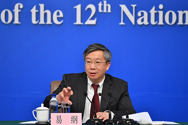 Yi Gang, deputy governor of the People's Bank of China, speaks at a news conference in Beijing, March 10, 2017. (Photo/Xinhua) Yi Gang, deputy governor of the People's Bank of China, speaks at a news conference in Beijing, March 10, 2017. (Photo/Xinhua)