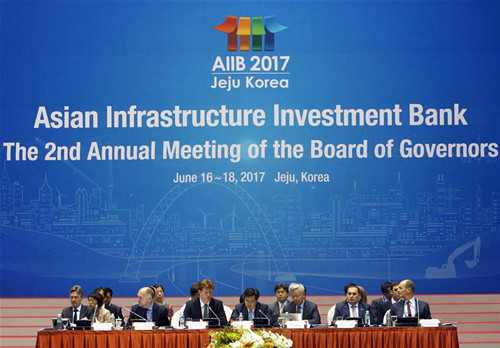 Photo taken on June 17, 2017 shows the Second Annual Meeting of the Board of Governors of the AIIB held in Jeju Island, South Korea. The 18-month-old Asian Infrastructure Investment Bank (AIIB) has won acclaim for its good work from representatives of all over the world at its Second Annual Meeting of the Board of Governors held here through Saturday. (Xinhua/Yao Qilin) Photo taken on June 17, 2017 shows the Second Annual Meeting of the Board of Governors of the AIIB held in Jeju Island, South Korea. The 18-month-old Asian Infrastructure Investment Bank (AIIB) has won acclaim for its good work from representatives of all over the world at its Second Annual Meeting of the Board of Governors held here through Saturday. (Xinhua/Yao Qilin)