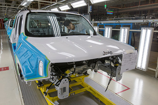 A GAC technician assembles a car at a plant in Guangzhou, Guangdong province. The company is negotiating with its Iranian counterparts on jointly constructing a facility in Iran. (Photo/for China Daily) A GAC technician assembles a car at a plant in Guangzhou, Guangdong province. The company is negotiating with its Iranian counterparts on jointly constructing a facility in Iran. (Photo/for China Daily)