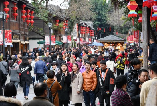 Tourists visit the SanfangQixiang (Three Lanes and Seven Alleys), a scenic spot in Fuzhou, capital of southeast China's Fujian Province, Feb. 21, 2018. (Xinhua/Lin Shanchuan) Tourists visit the SanfangQixiang (Three Lanes and Seven Alleys), a scenic spot in Fuzhou, capital of southeast China's Fujian Province, Feb. 21, 2018. (Xinhua/Lin Shanchuan)