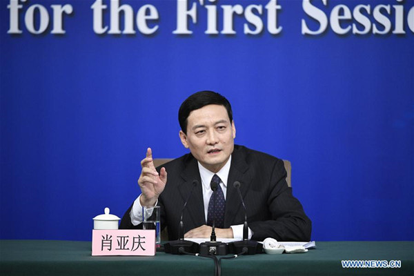 Xiao Yaqing, head of the State-owned Assets Supervision and Administration Commission (SASAC), answers questions at a press conference on reform and development of state-owned enterprises on the sidelines of the first session of the 13th National People's Congress in Beijing, capital of China, March 10, 2018. (Xinhua/Wang Peng)