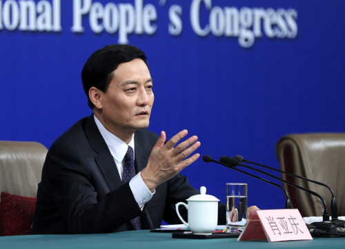 Xiao Yaqing, head of the State-Owned Assets Supervision and Administration Commission, speaks on Saturday on the sidelines of the 13th National People's Congress. (Photo/China Daily) Xiao Yaqing, head of the State-Owned Assets Supervision and Administration Commission, speaks on Saturday on the sidelines of the 13th National People's Congress. (Photo/China Daily)