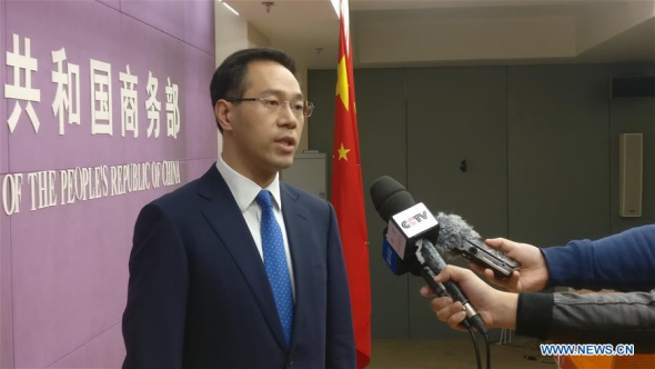 Gao Feng, spokesperson for China's Ministry of Commerce, is interviewed in Beijing, capital of China, April 6, 2018. China will fight