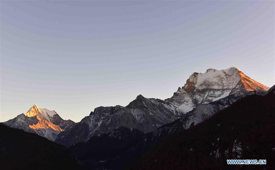 Photo taken on Dec. 31, 2016 shows mountains in Yading Nature Reserve in Daocheng County of Tibetan Autonomous Prefecture of Garze, southwest China\'s Sichuan Province. (Xinhua/Liu Kun)