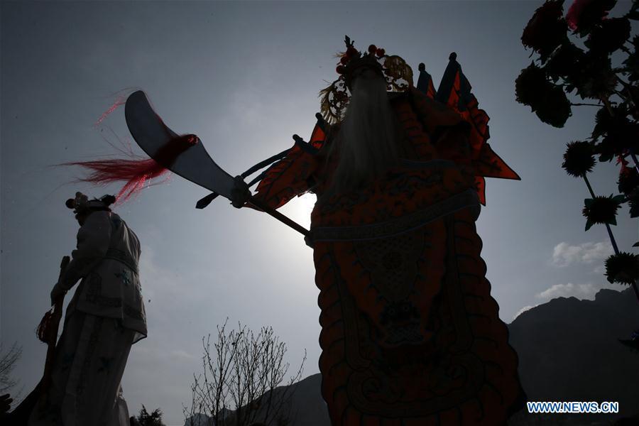 Villagers perform shehuo in Wudu District of Longnan, northwest China\'s Gansu Province, Feb. 8, 2017. Shehuo is a type of entertainment popular in Wudu during the Spring Festival. The performance of Shehuo can be traced back to ancient rituals to worship the earth, which they believe could bring good harvests and fortunes in return. (Xinhua/Cai Yang)