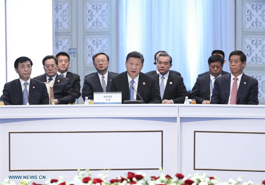 China calls for solidarity, cooperation as SCO admits new members(1/4)